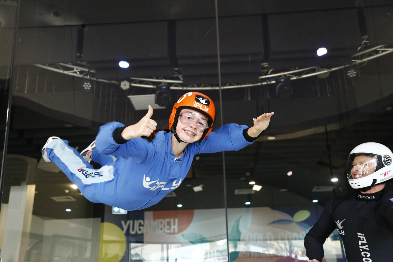 Young girl indoor skydiving