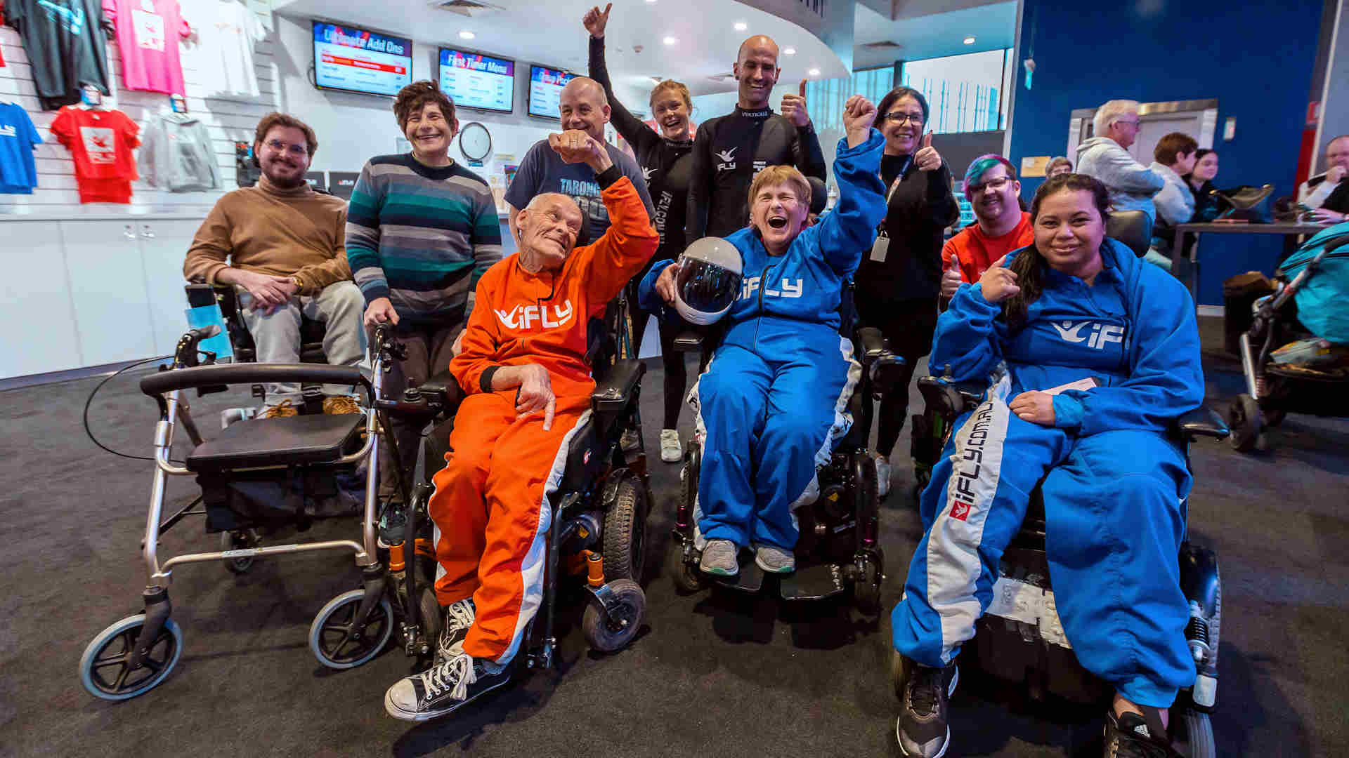 Group of people living with disability looking happy at iFLY Downunder